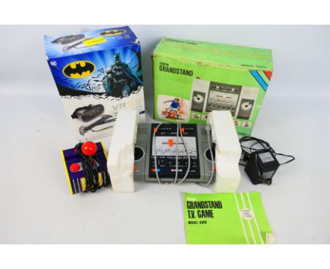 Adman - Vivid - Jakks Pacific - A boxed Grandstand 6000 console, a boxed Batman VRSE virtual reality entertainment set and an