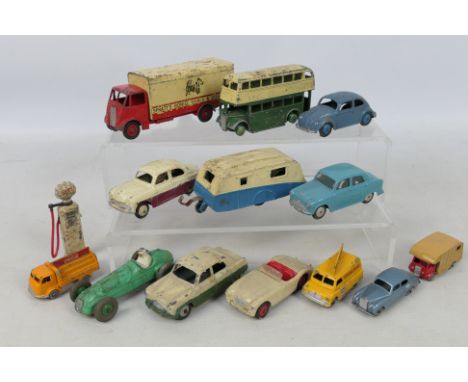 Dinky Toys - Corgi Toys - Matchbox - An unboxed collection of diecast model vehicles in various scales. Lot includes Dinky To