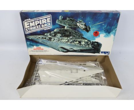  MPC - A boxed Star Wars the Empire Strikes Back 'Star Destroyer' model kit- The 1980 #1-1926 unbuilt model kits parts are pr
