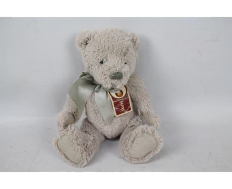 Charlie Bears - A Charlie Bear entitled 'My First Charlie Bear' - Bear has plastic eyes, and stitched nose and mouth. Bear is