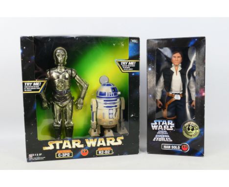 Kenner - Star Wars - A boxed 1997 Collector Series Han Solo figure and a boxed Electronic C-3PO &amp; R2-D2 set. The figures 