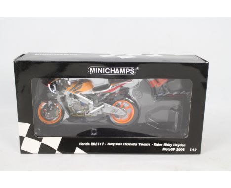 Minichamps - A boxed Minichamps #122061069 Honda RC211V Repsol Honda Team 'Nicky Hayden' MotoGP 2006 1:12 scale motorcycle. T