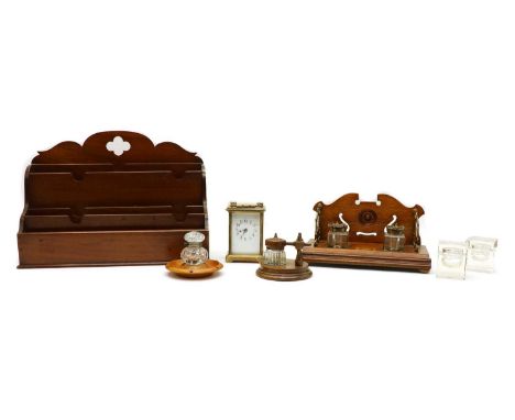A brass cased carriage clock, the white dial with Arabic numerals, 11cm high, an early 20th century mahogany waterfall letter