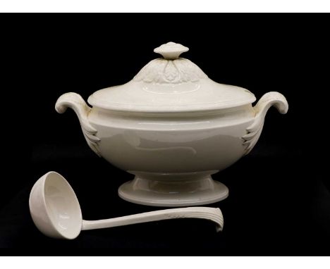 A creamware oval tureen, early 19th century, the cover with an acanthus-moulded finial, the body set with twin handles and ra