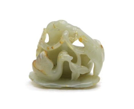 A Chinese jade carving, of a goose with a lotus stem in its beak and a gosling to its side, 5.5cm longCondition report: Russe