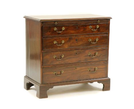 A George III mahogany bachelors chest, mid to late 18th century, with brushing slide over four graduated long drawers and on 