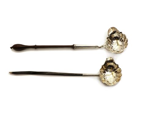 An 18th century silver and wood handle toddy ladle, stamped with maker's mark, lion passant and leopards head, by Isaac Cooks