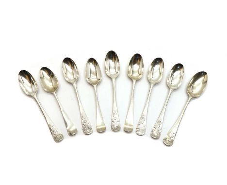 A set of five 18th century silver teaspoons, stamped with maker's mark, distorted, and lion passant, each stem decorated with