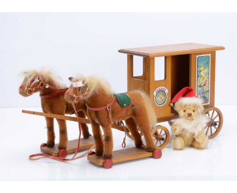 A Steiff Limited edition Santa's Express set, 852 of 2002, wooden carriage, decorated with printed metal signs, drawn by two 