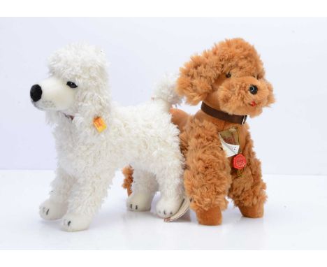 A Steiff yellow tag poodle, made for the American Kennel Club, with tag --12 1/2in. (32cm.) high; and a Hermann golden plush 
