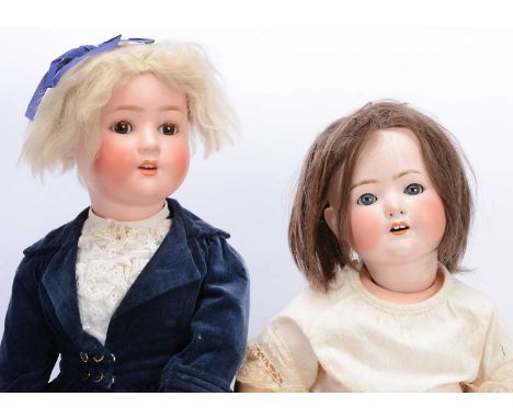 Two German bisque headed dolls, a Heubach 320 with blue sleeping eyes, brown hair wig, bent limb composition body amd cream c