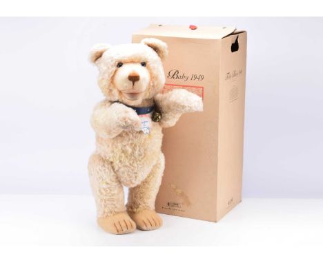 A Steiff limited edition Teddy Baby 1949 replica, 398 of 1500, with blue leather collar, in original box with certificate --2