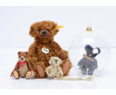 A Steiff limited edition teddy bear in crystal ball, 1489 of 1500, with blue mohair bear hanging within glass Christmas ornam