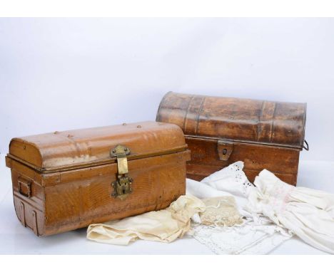 Two small painted tinplate trunks, one with wood grain finish and brass catch --18in. (46cm.) wide; a quantity of children's 