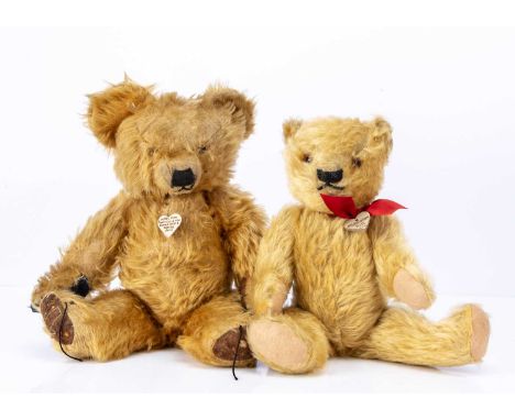 Two post-war British teddy bears,  a golden mohair Merrythought, with black stitched nose, mouth and claws, swivel head and j