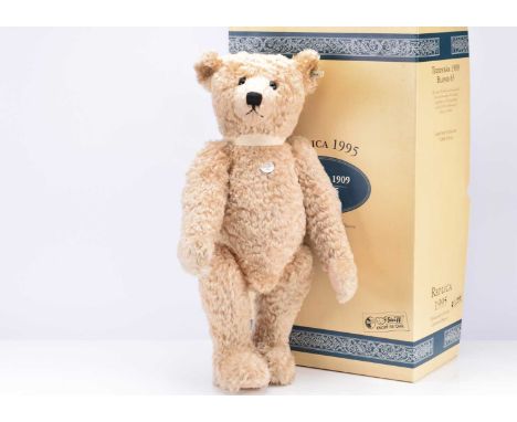 A Steiff limited edition Teddy Bear 1909 blonde replica, 2267 of 5000 in original box with certificate --25 1/2in. (65cm.) hi