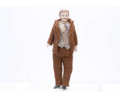 A German bisque shoulder-head gentleman dolls' house doll,  with light brown moulded and painted side parted hair and moustac