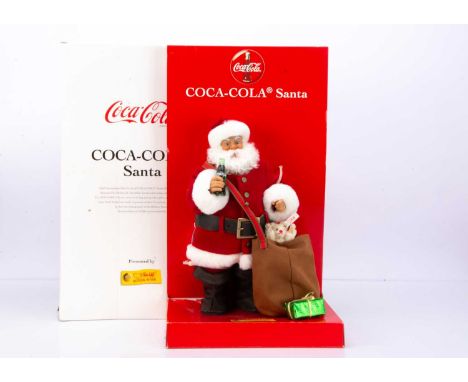 A Steiff limited edition Coca-Cola Santa Claus 2241 of 10,000, a recreation of the 1931 Haddon Sundblom advertising campaign,