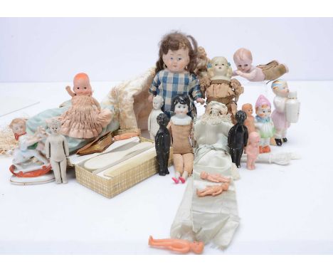 Various small dolls and dolly related items,  a brush and comb set in original box; a cream Chinese shawl (stained); a china 