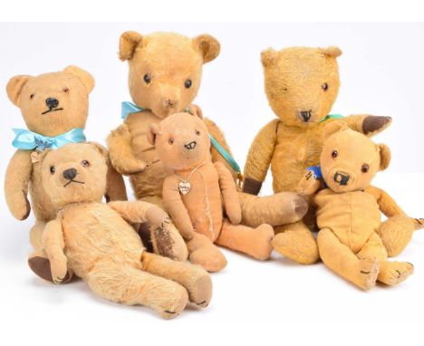 Six post-war British teddy bears,  including a Chiltern type and a larger Pedigree --22in. (56cm.) high ( wear and thinning t