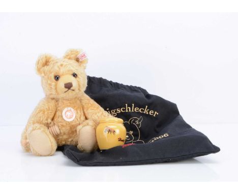 A Steiff limited edition Honigschlecker (Honey Licker) teddy bear,  494 of 1500, with pot and spoon, in original fabric bag w