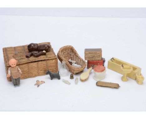Various items, a brass comb case, two matchbox Penny Toys, composition black baby, Stodart crawling baby, a yellow plaster do