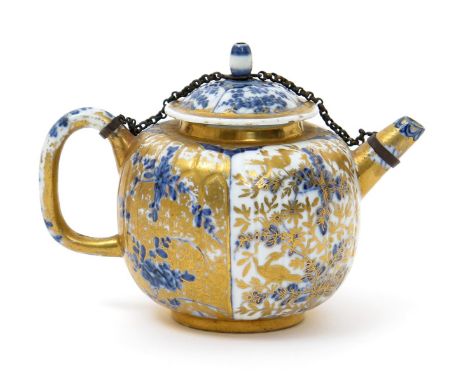 A Meissen Hausmaler teapot and cover,  c.1720-25, the reeded globular form painted in underglaze blue with panels of Oriental