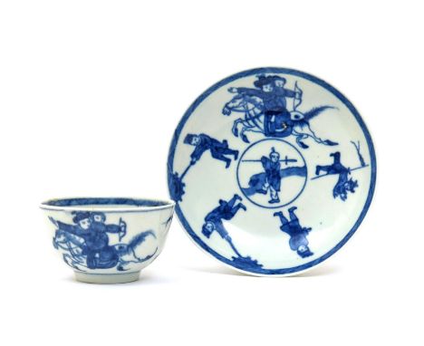 A Worcester blue and white small teabowl and saucer, c.1765-70, painted with the Eloping Bride pattern, the fated couple on h