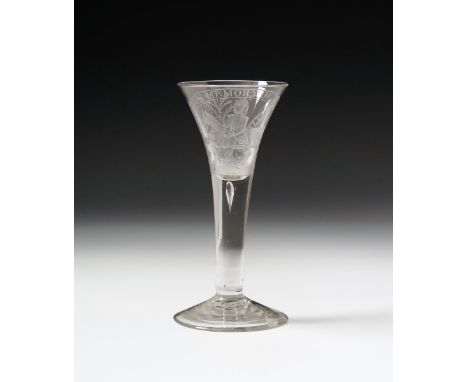 A commemorative wine glass, c.1760, of Williamite type, engraved at a later date with an equestrian portrait beneath a banner