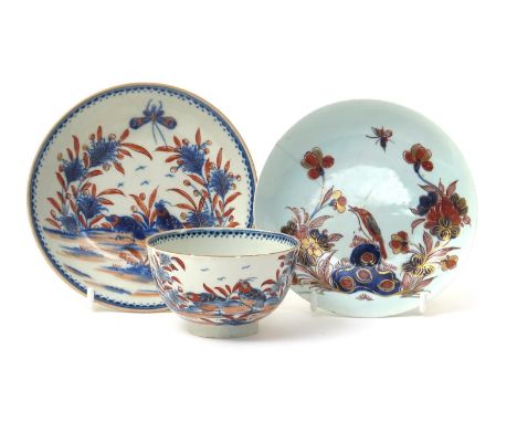 A Worcester teabowl and saucer and a Vauxhall saucer, c.1770, the Worcester decorated in underglaze blue in the Two Quail pat