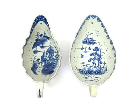 Two Worcester blue and white sauceboats, c.1775-80, of low-footed fluted form, one painted with the Full Moon pattern, the ot