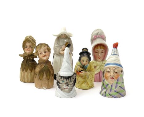 Four Royal Worcester candle snuffers, late 19th and early 20th century, including Mr Caudle, the Young Girl, a nun and a knee