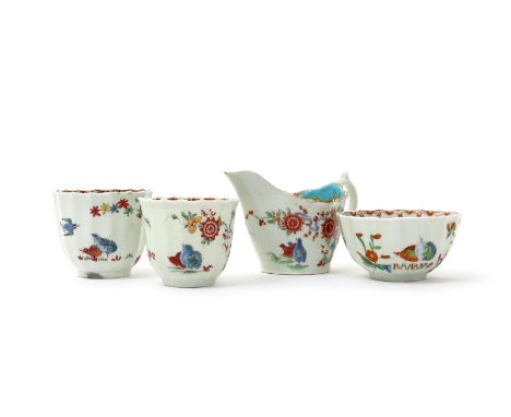 Two Worcester coffee cups and a teabowl,  c.1765-75, of Warmstry fluted type, painted in the Kakiemon palette with the Two Qu