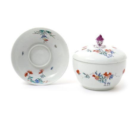 A Meissen sucrier and cover, late 18th/early 19th century, painted in the Kakiemon palette with Oriental flower sprigs, blue 