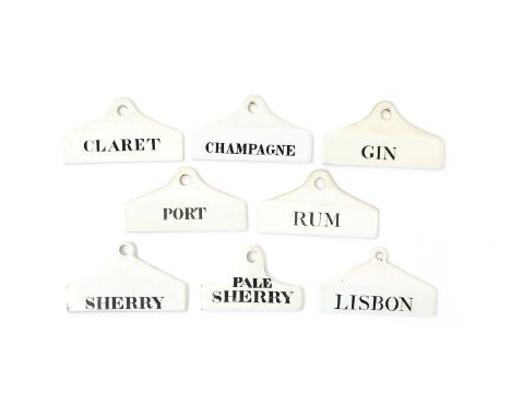 Eight creamware bin labels, 1st half 19th century, most Wedgwood, of coathanger form, ariously titled in black with 'Sherry',