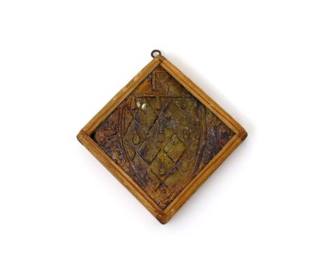 A medieval lead-glazed floor tile from Croyland Abbey, late 14th century, Bawsey Tilery (Norfolk), decorated in low relief wi
