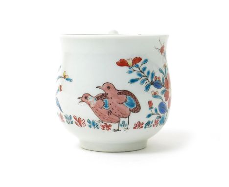 A rare Worcester coffee cup, c.1758, the squat bell-shaped body painted in a variation of the Kakiemon palette with a rare ve