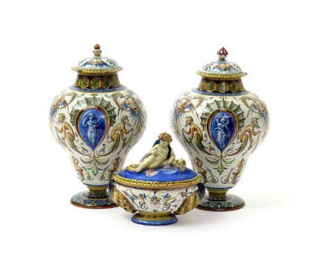 A pair of Ginori maiolica vases and covers, late 19th/20th century, painted in the Renaissance style with panels of Classical