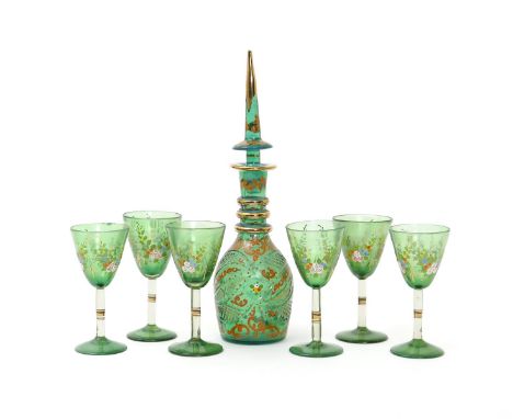 A Bohemian suite of glass for the Ottoman market, 19th century, a decanter and stopper with six goblets, the green glass body