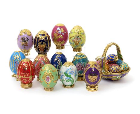 A Franklin Mint House of Fabergé Spring basket with nine eggs, 20th century, the basket moulded with lily of the valley spray