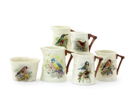 Five Royal Worcester ornithological milk jugs, date codes for 1911, 1928, 1930 and 1932, painted by Powell and Norwood with B