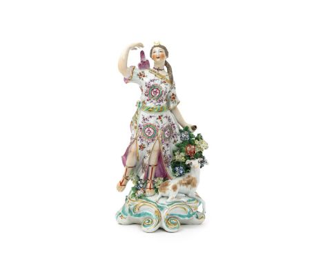 A large Derby figure of Diana, c.1765, reaching for an arrow from a quiver slung on her back, wearing a flowing pink cloak ov