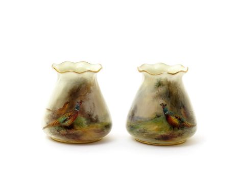 A small pair of Royal Worcester vases, date codes for 1919, the sack forms painted by James Stinton each with a pair of pheas
