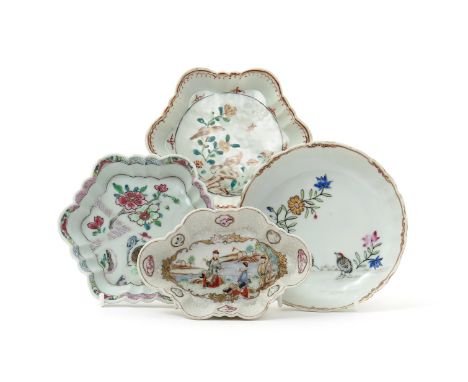 Two Chinese porcelain teapot stands and a spoon tray, 18th century, of hexagonal form, one stand painted in famille verte col