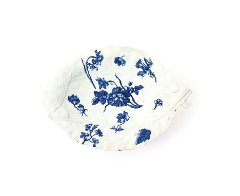 A large Worcester blue and white leaf dish, c.1765, moulded with two overlapping leaves and naturalistically painted with spr