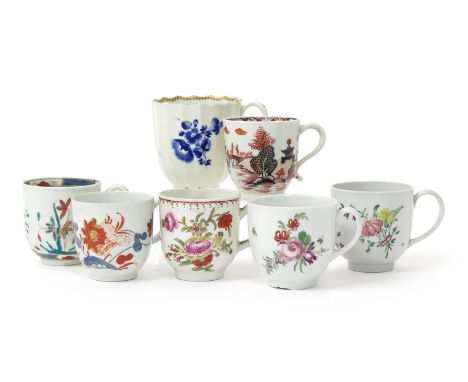 Seven English porcelain coffee cups, c.1755-65, two Bristol and painted with sprays of flowers in polychrome enamels, two Bow