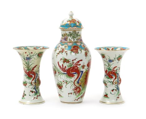 A rare Worcester three vase garniture, c.1768-72, formed of an ovoid vase and cover and two gu beaker vases, all brightly dec