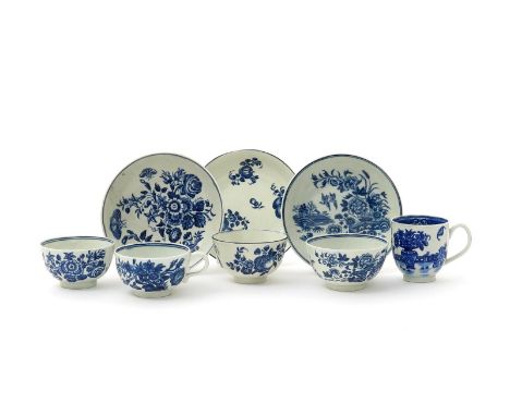 Three Worcester blue and white teabowls and saucers, c.1780, variously printed with the Three Flowers, Fence and Fruit Sprays