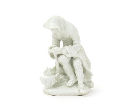 A Bow white-glazed figure of Winter, c.1754, modelled as a man in a hooded cloak, huddled over a flaming brazier and warming 