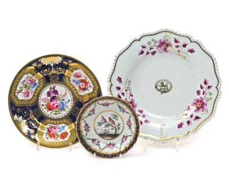 Two English porcelain plates, c.1810-20, one Flight, Barr & Barr and decorated with the crest of a lion within a belt inscrib